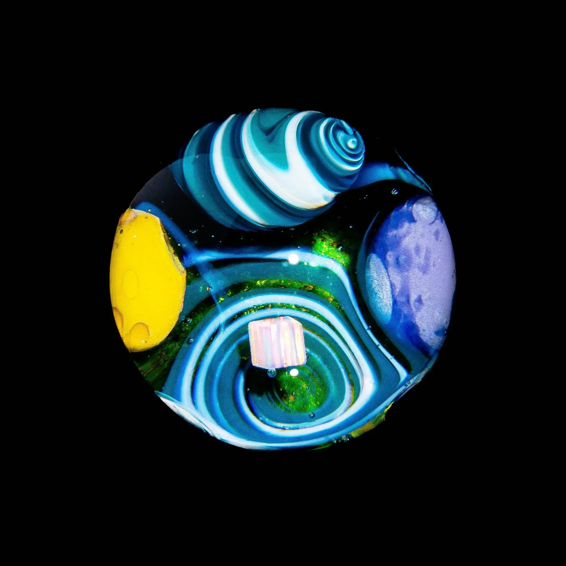 Heady glass marble with vibrant galaxy and planet designs on a black background