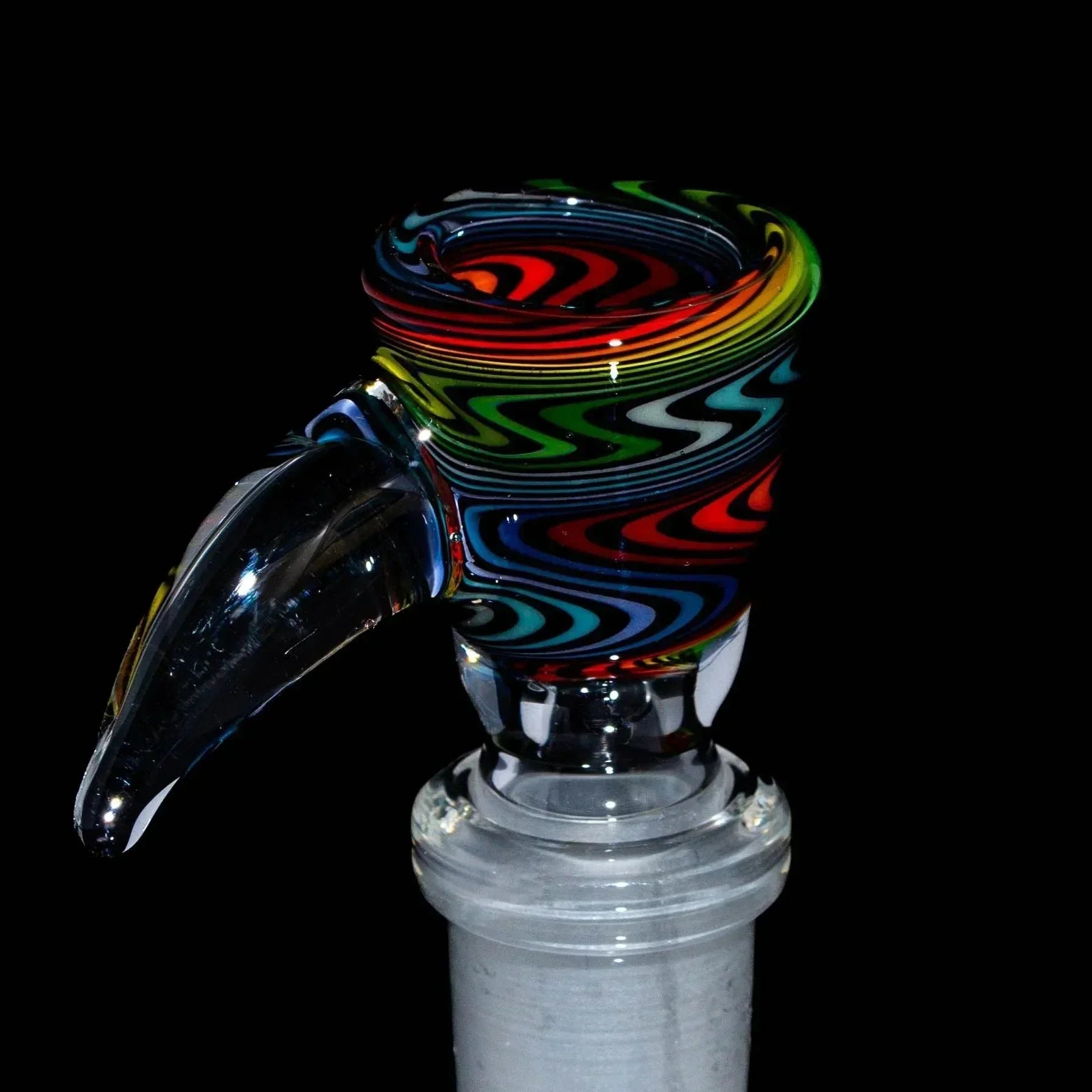 Handcrafted glass bowl slide with black rainbow wig wag pattern and clear flare handle