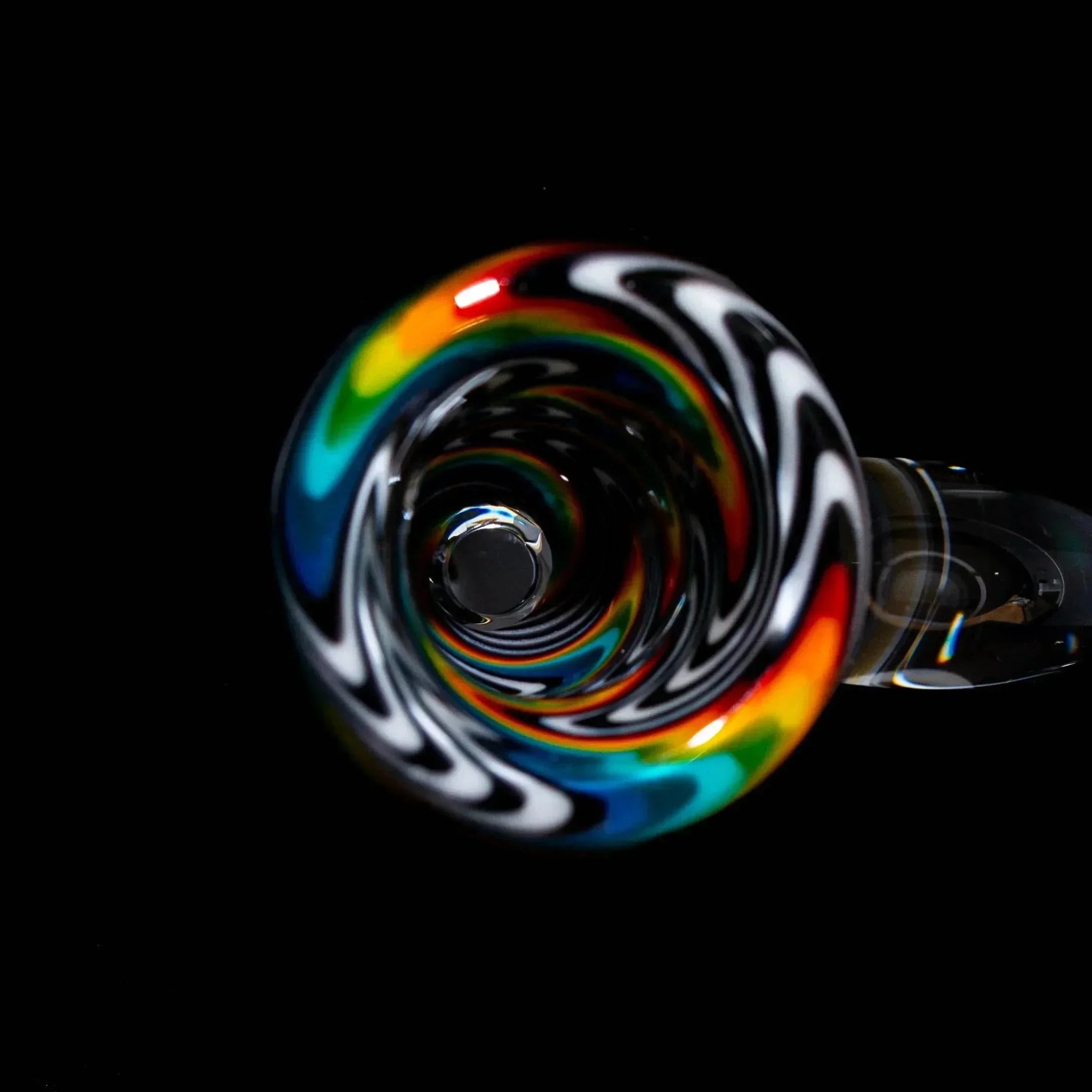 Colorful wig wag 14mm glass bowl slide with black, white, and rainbow swirl design on black background