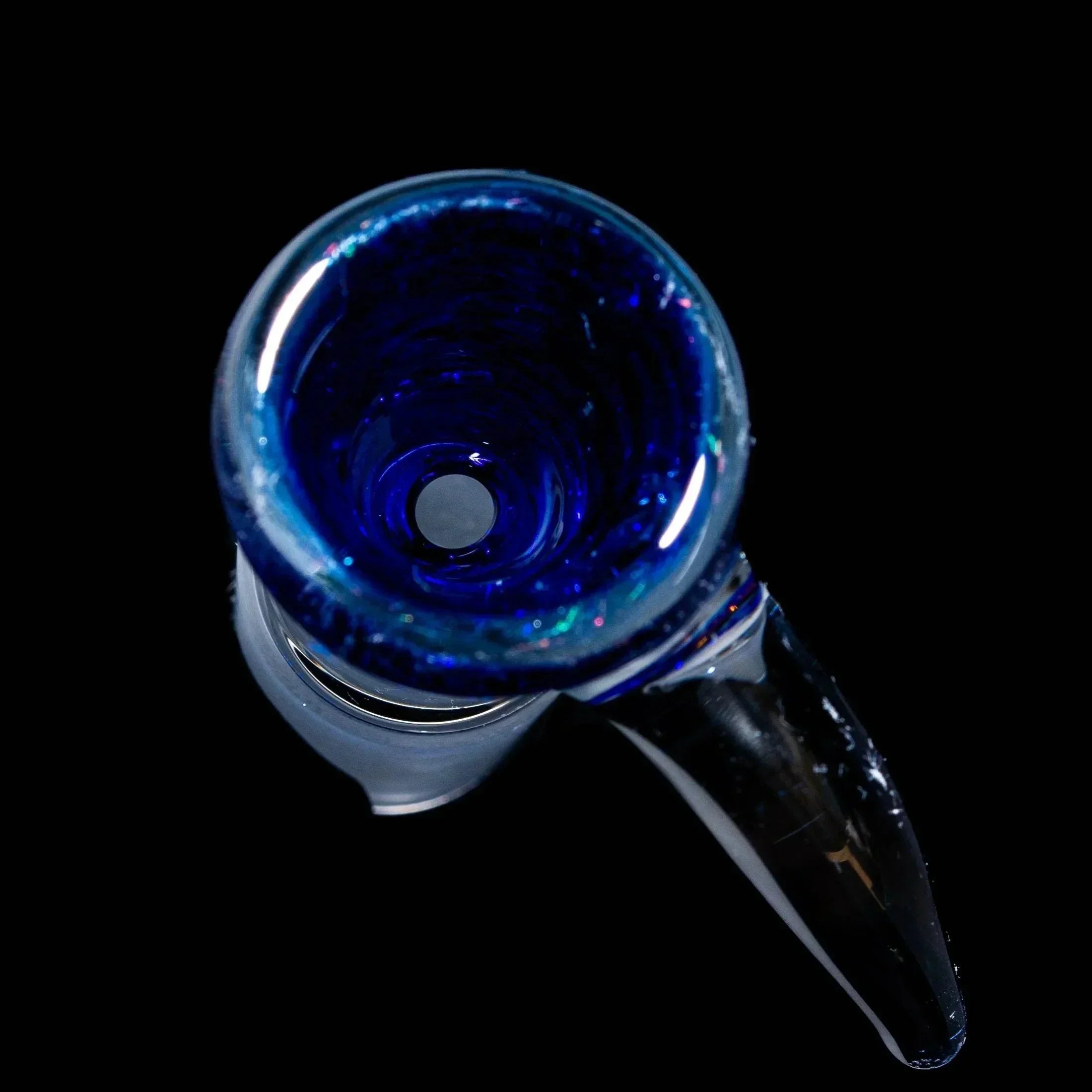 Blue dichroic glass bowl slide with flared rim and rainbow accents on black background
