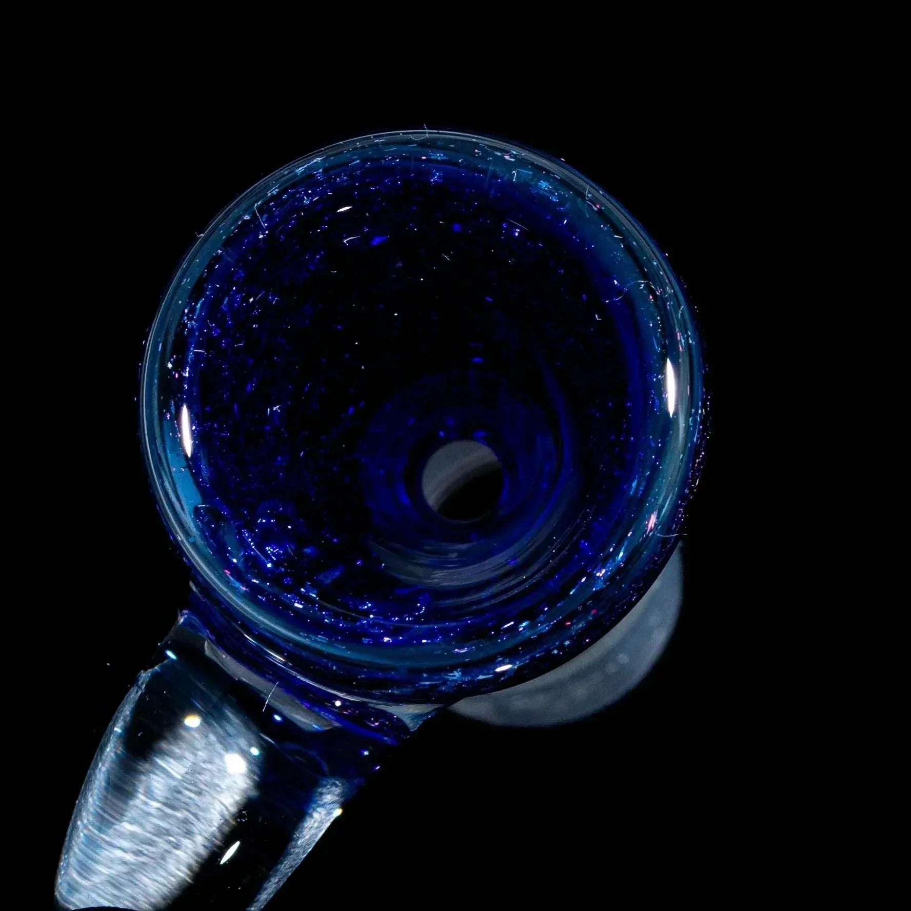Blue glass bowl slide with flared rim and sparkly accents on black background