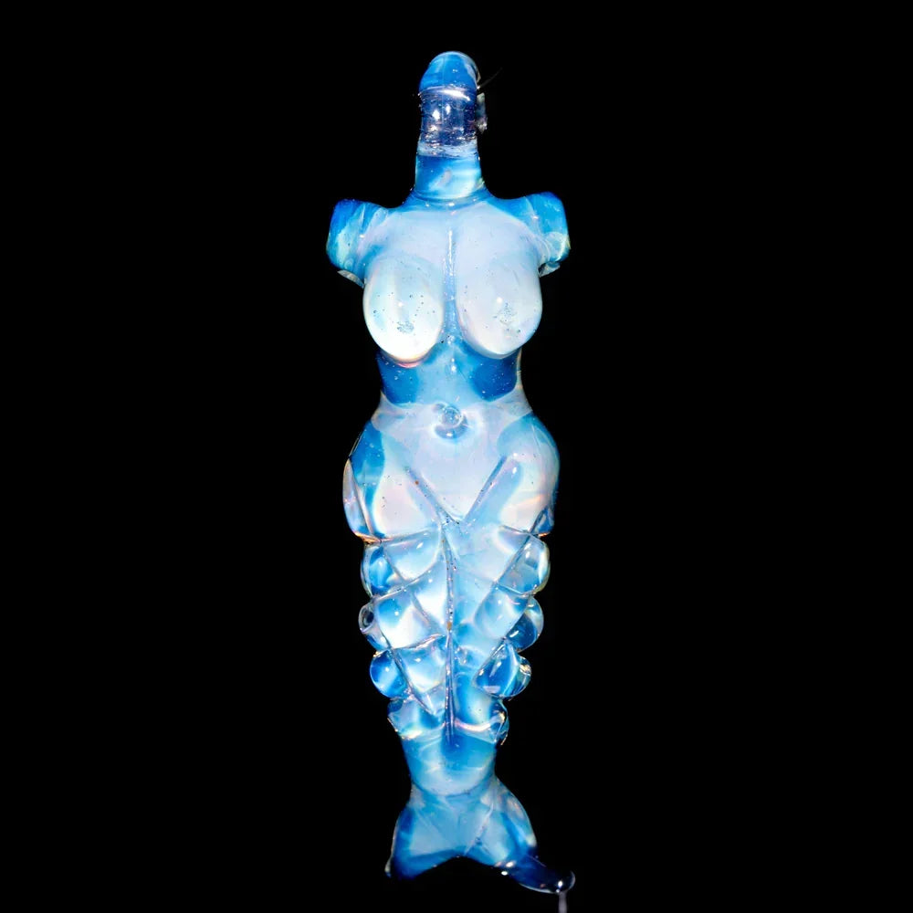 Handcrafted glass mermaid pendant with blue and clear details on black background