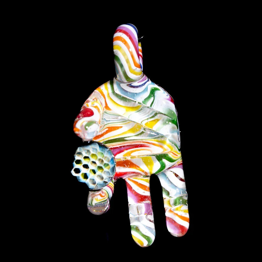 Colorful glass pendant shaped like a hand with rainbow swirl patterns and a blue honeycomb accent