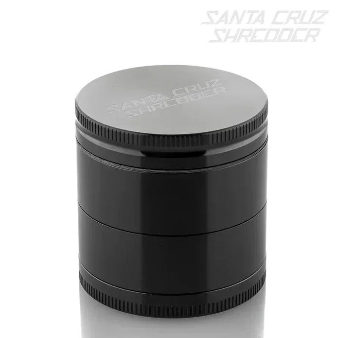 Black Santa Cruz Shredder herb grinder with textured lid and sleek cylindrical design