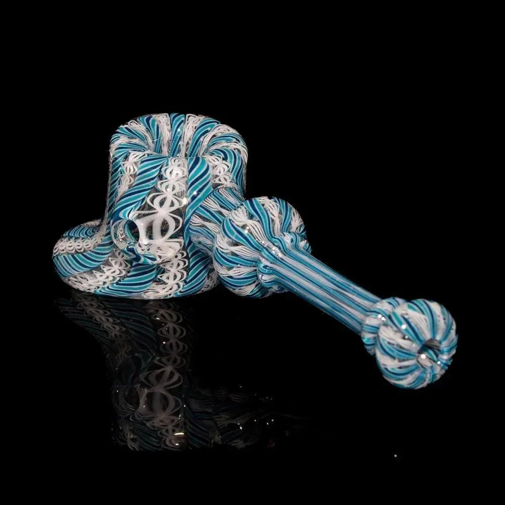 Handblown navy and teal zanfirico glass hammer pipe with intricate swirling designs