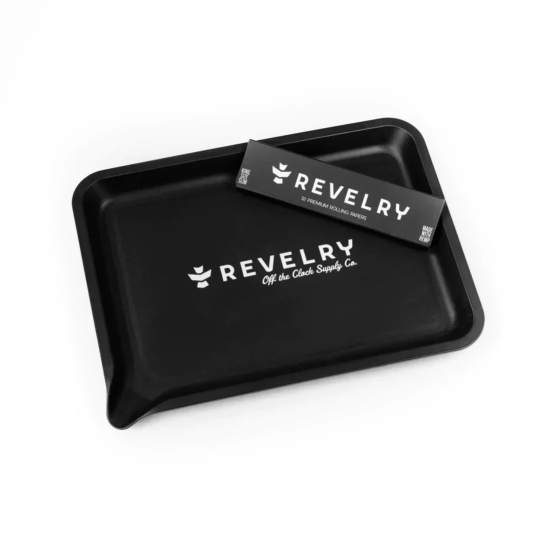 Black Revelry rolling tray with matching black premium rolling papers on white background