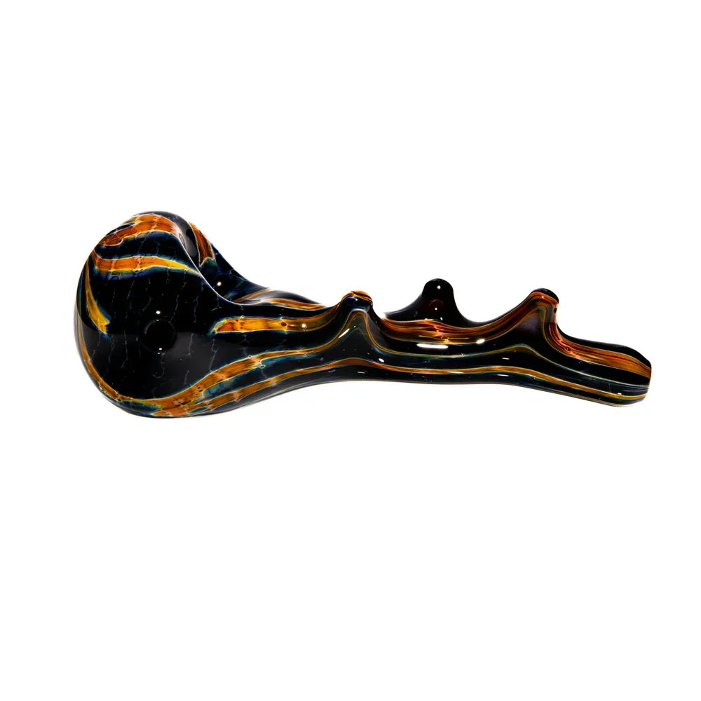 Colorful glass smoking pipe shaped like a burnt branch, with orange and blue accents