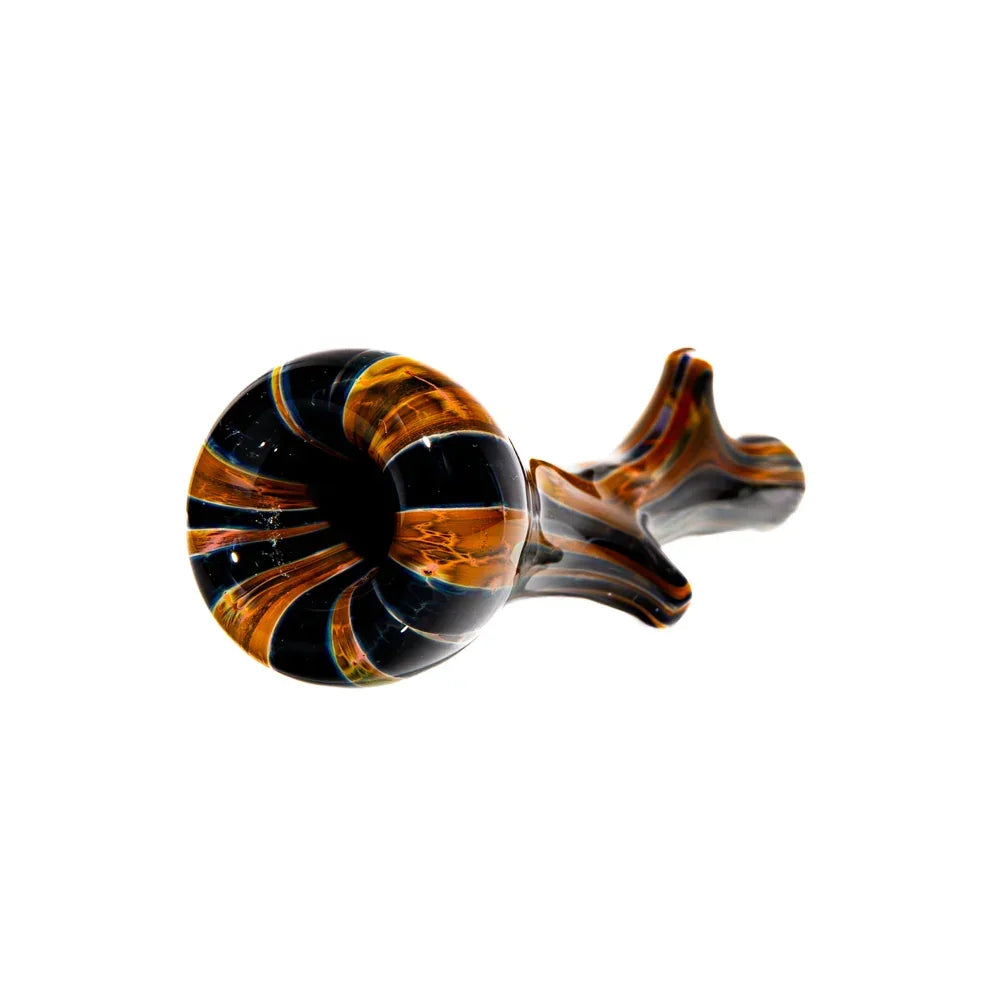 Hand-blown glass pipe with brown and black swirls on a white background
