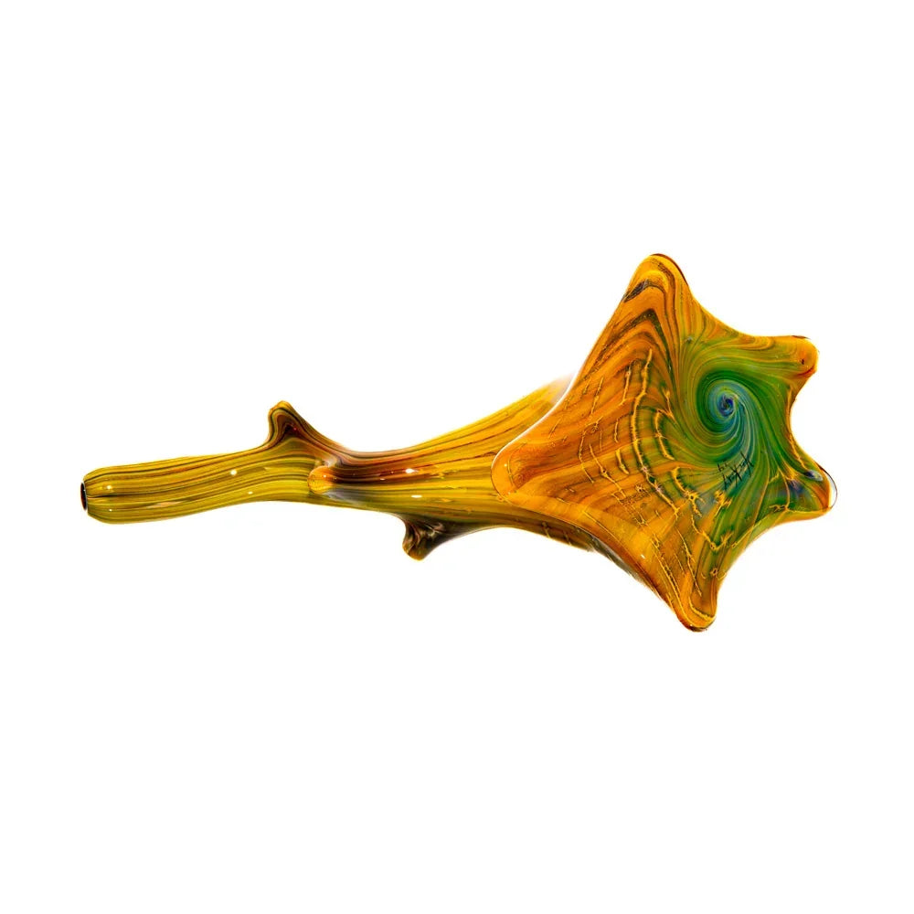 Hand-blown glass spoon pipe with windswept, swirled yellow and green design on white background.