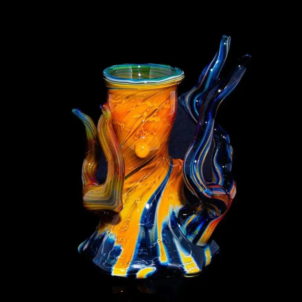 Vibrant hand-blown glass water pipe with swirling orange, yellow, and blue artistic design.