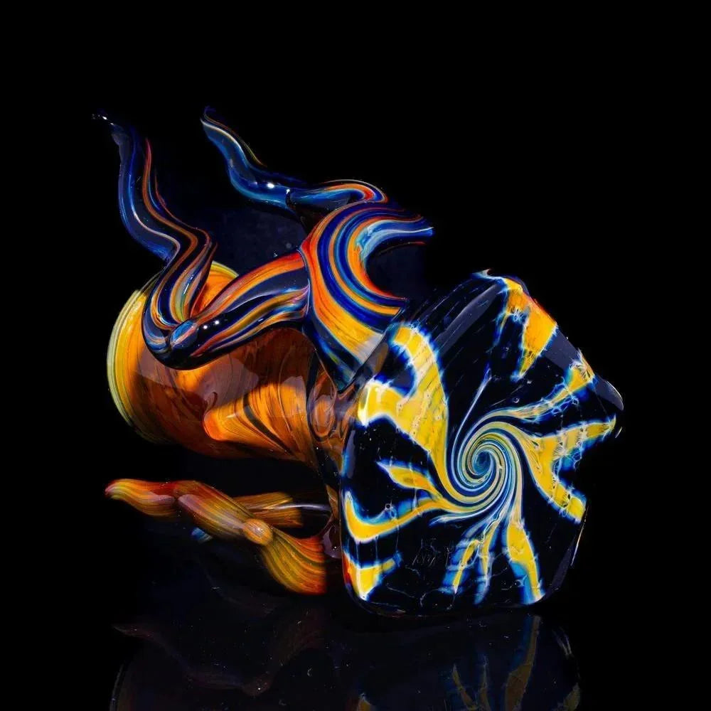 Hand-blown glass pipe with vibrant swirl pattern and intricate marble base on black background