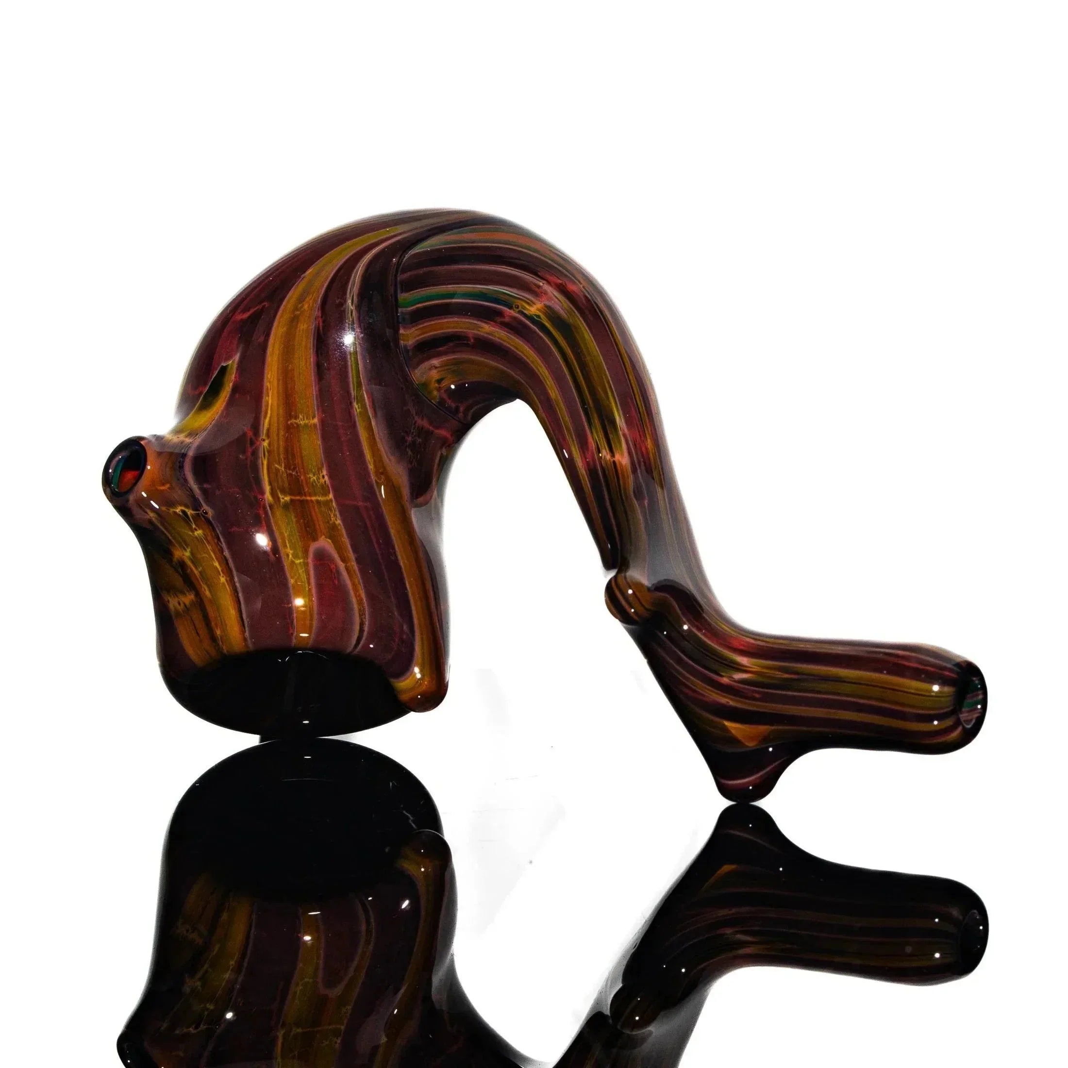 Colorful glass Sherlock pipe with maroon and gold swirls on a reflective surface