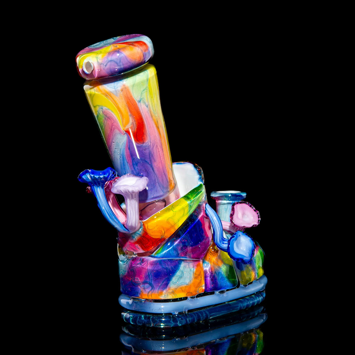 Colorful heady glass water pipe with swirling rainbow patterns and sculpted mushroom accents