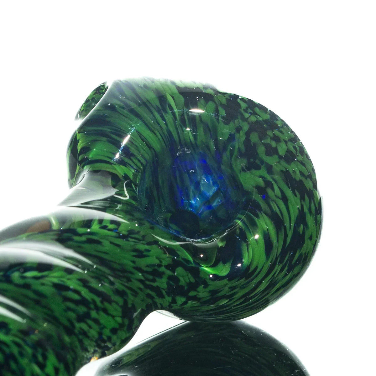 Green and black frit glass hand pipe with twist design on a white background
