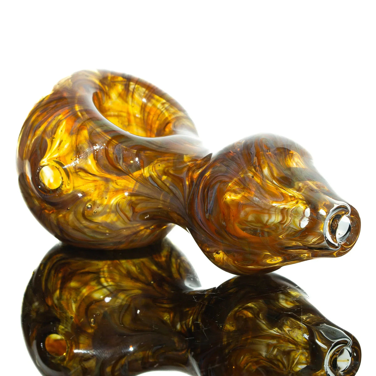 Orange glass spoon pipe with slyme wrap, hourglass shape, and reflective surface