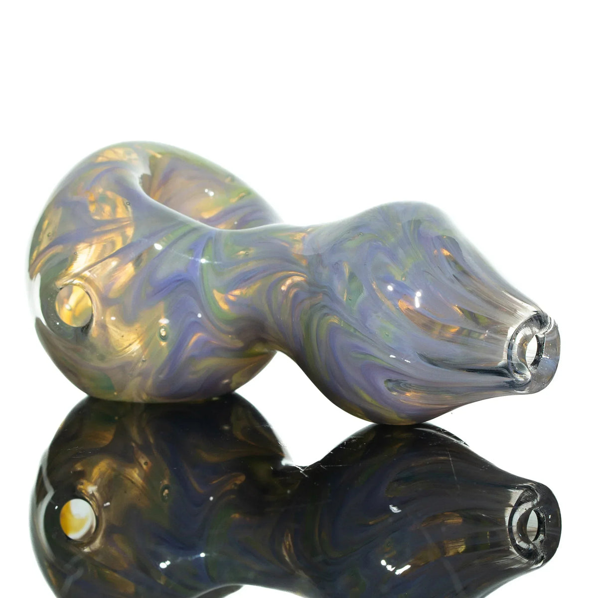 Colorful glass hourglass spoon pipe with pink and purple swirls on a reflective surface