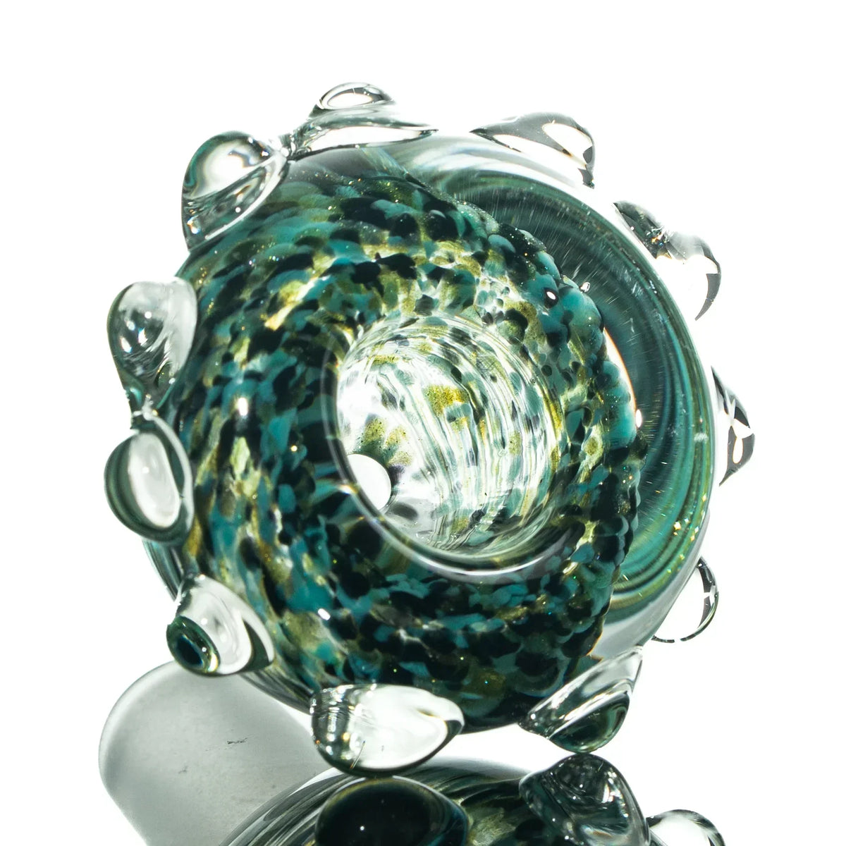 Teal and black 14mm glass slide bowl with clear marble accents, frit pattern close-up