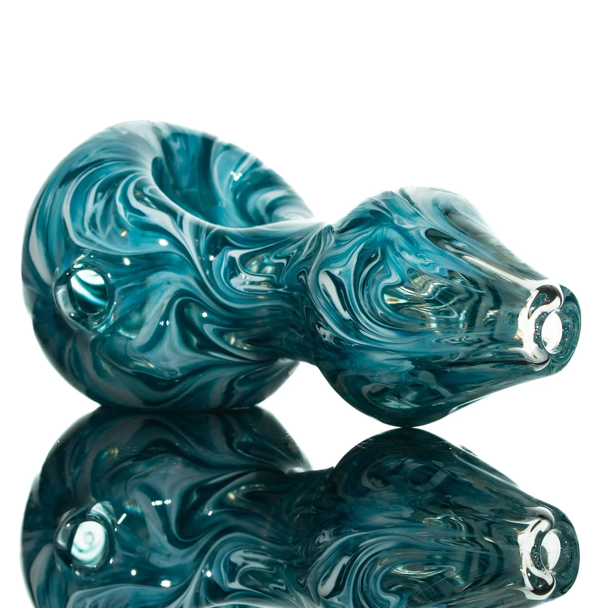 Teal and white glass spoon pipe with swirl pattern and reflective surface