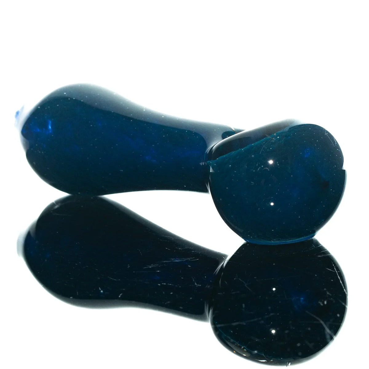 Dark blue glass hand pipe with a glossy finish, shown on a reflective surface.
