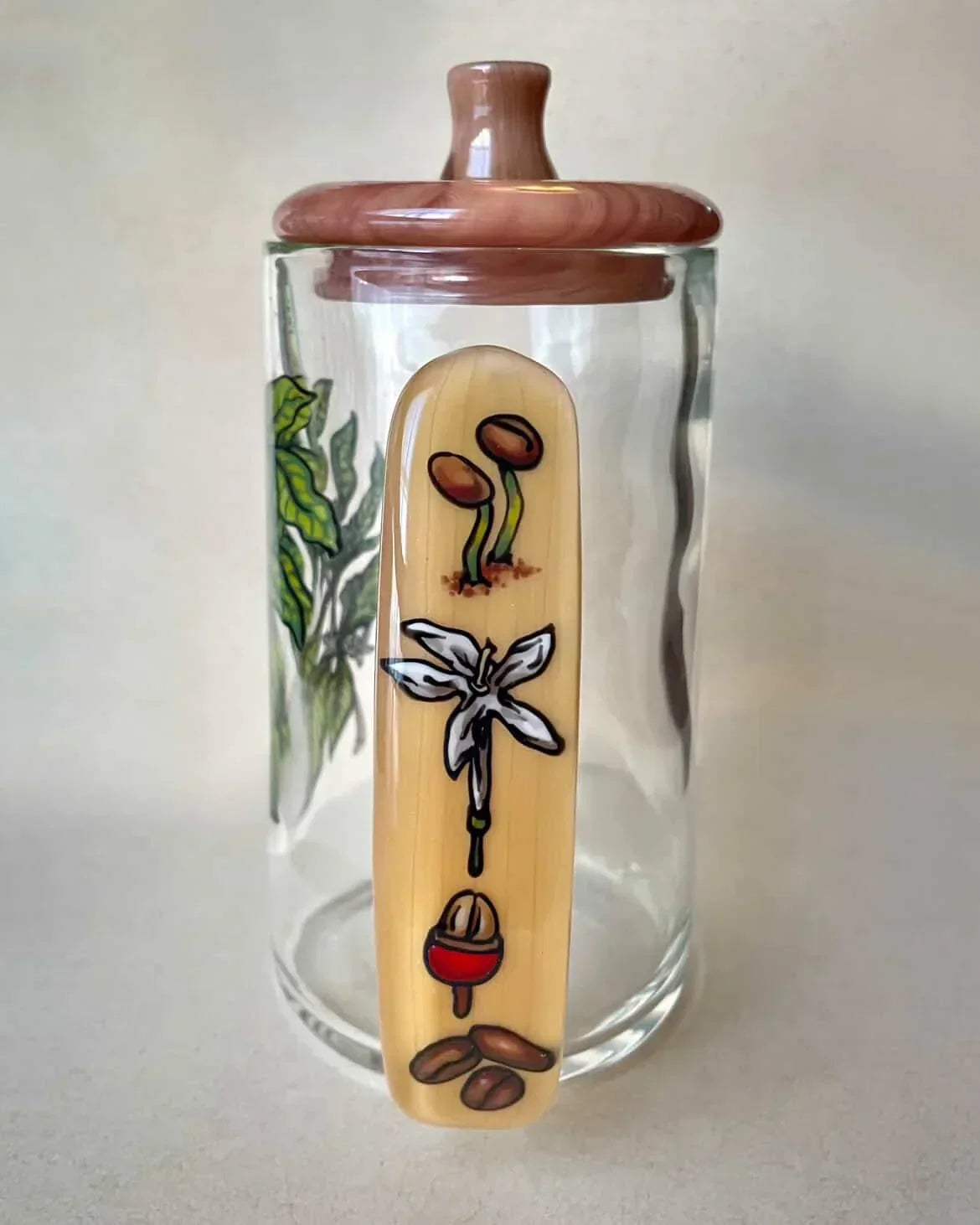 Glass storage jar with botanical and coffee art, wooden lid, smoke shop accessory
