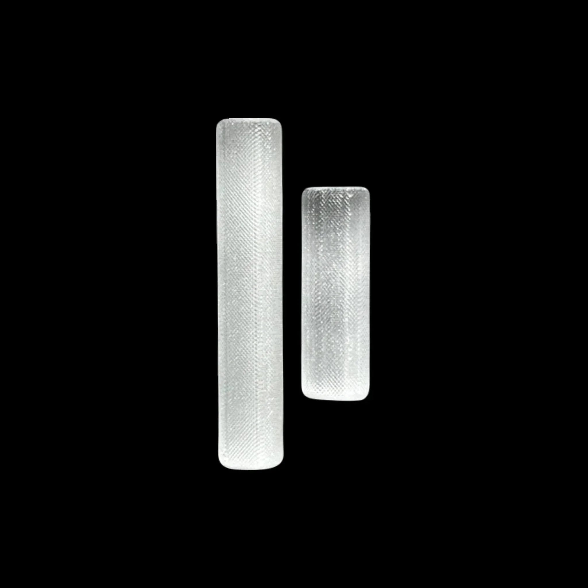 Two clear textured glass one hitters on black background