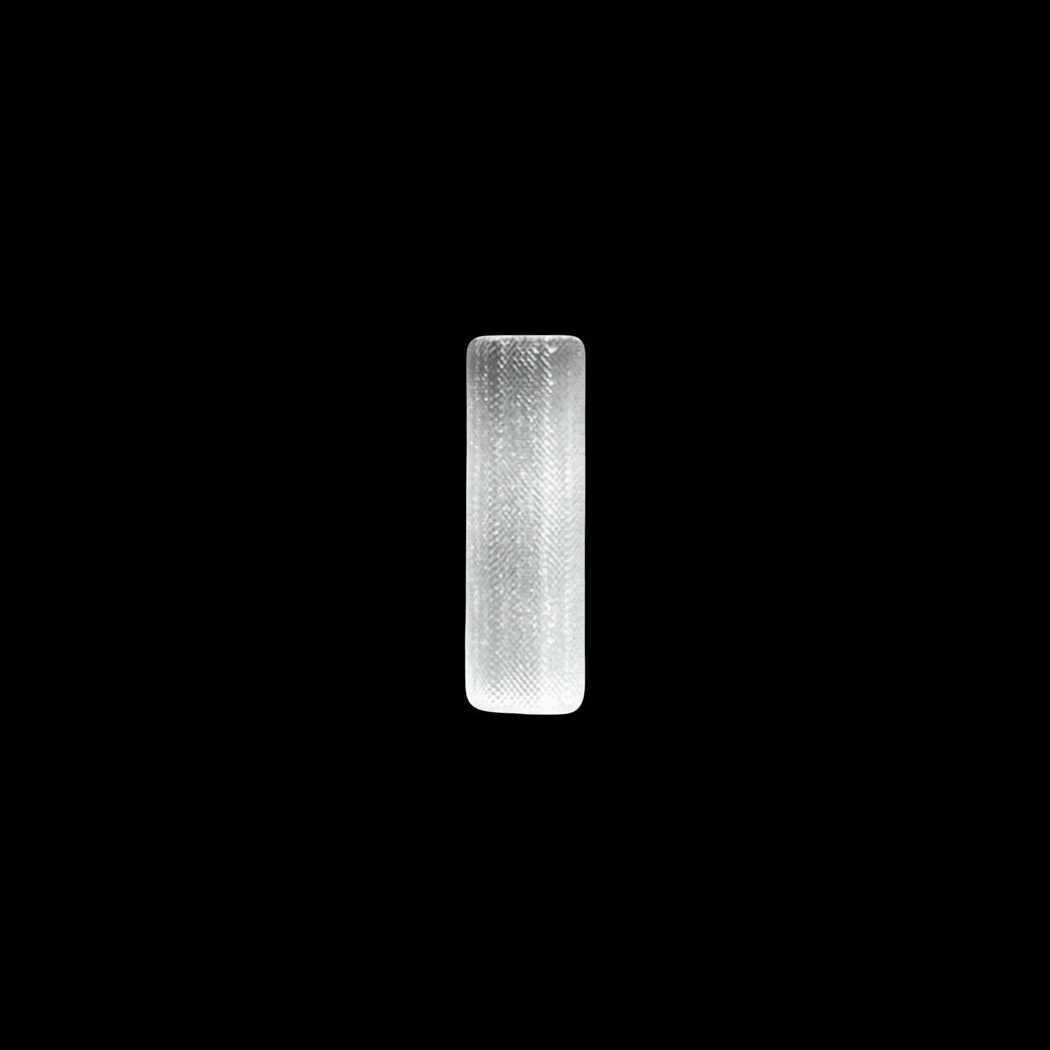 Clear textured glass accessory for vaporizers or smoking devices on black background