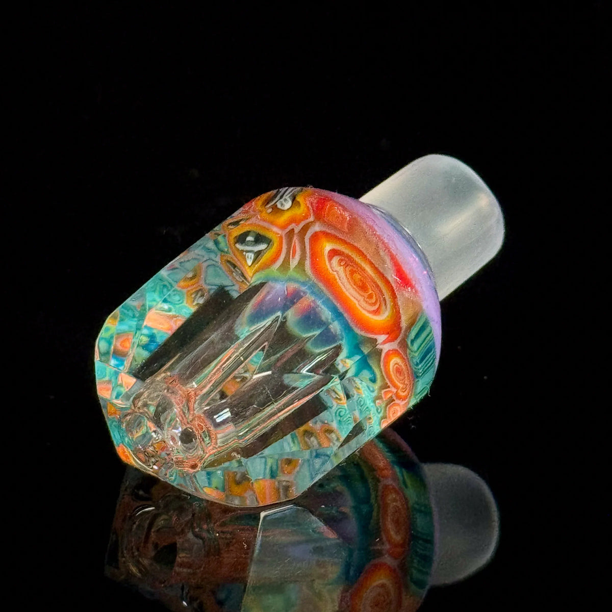 Colorful heady glass bowl with intricate patterns for smoking accessories on black background