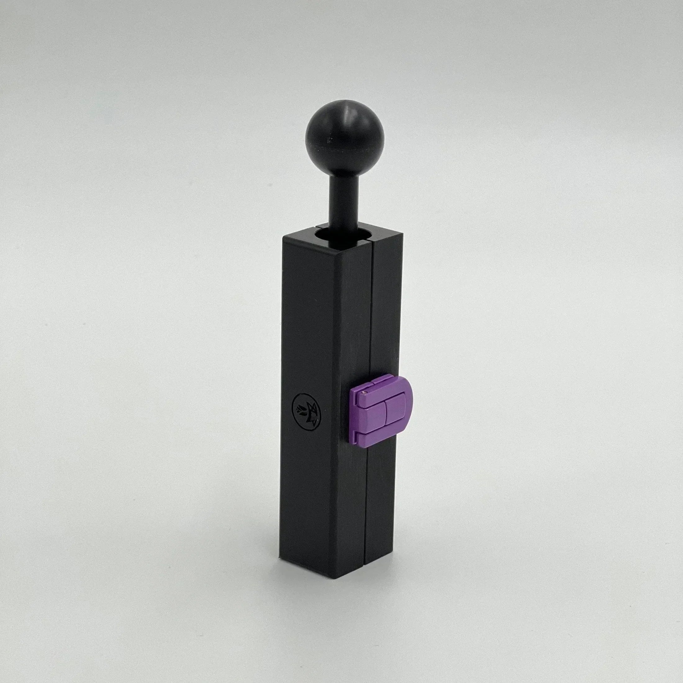 Black metal smoking pipe with purple switch and round handle on white background