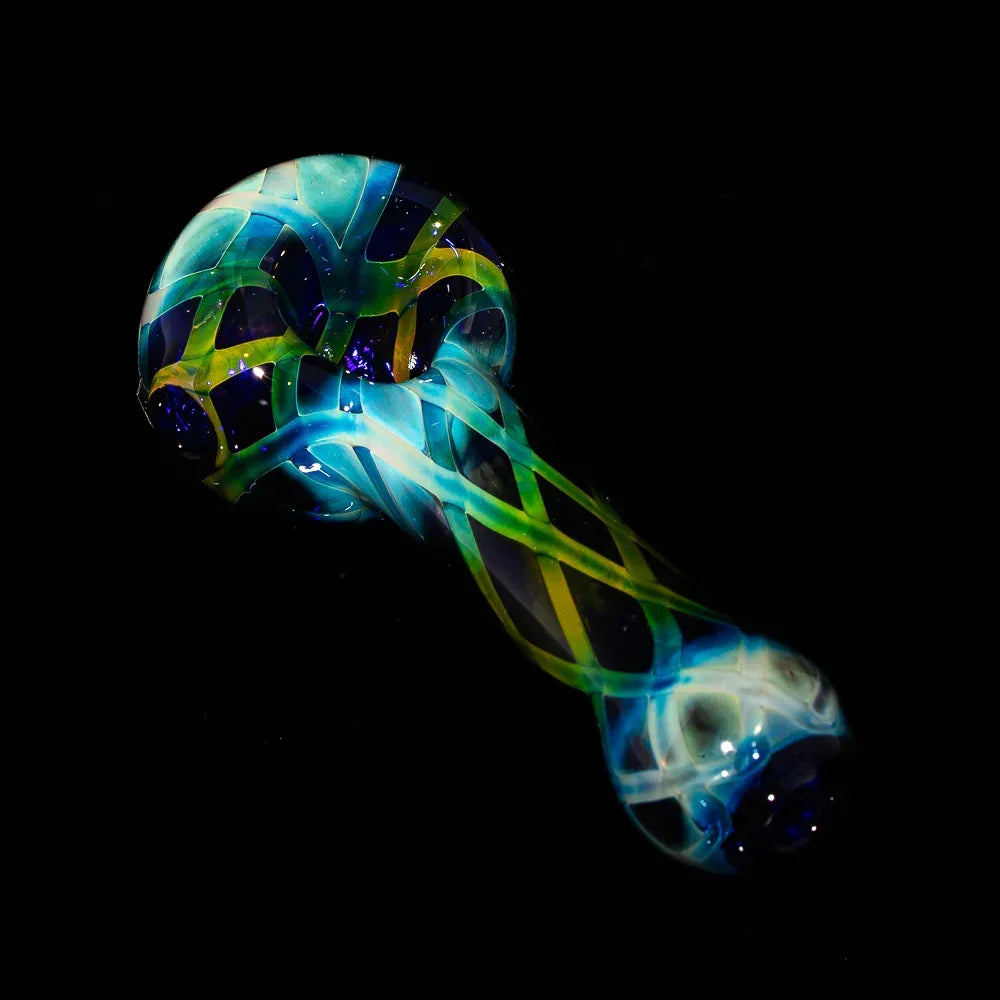 Blue crosshatch glass spoon pipe with vibrant yellow and green accents on black background