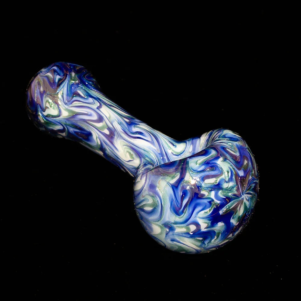 Blue marble glass hand pipe with swirled design on black background