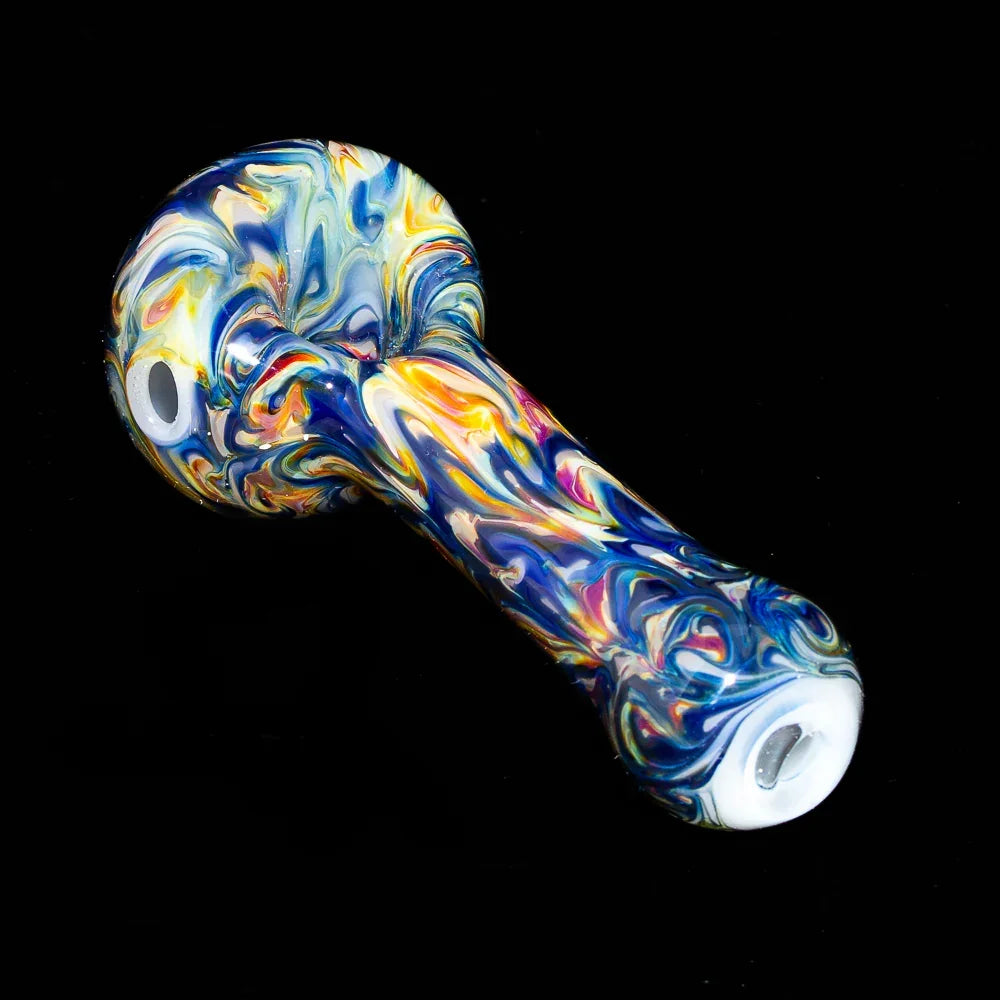 Colorful blue and yellow marble glass spoon pipe with vibrant swirl patterns on black background
