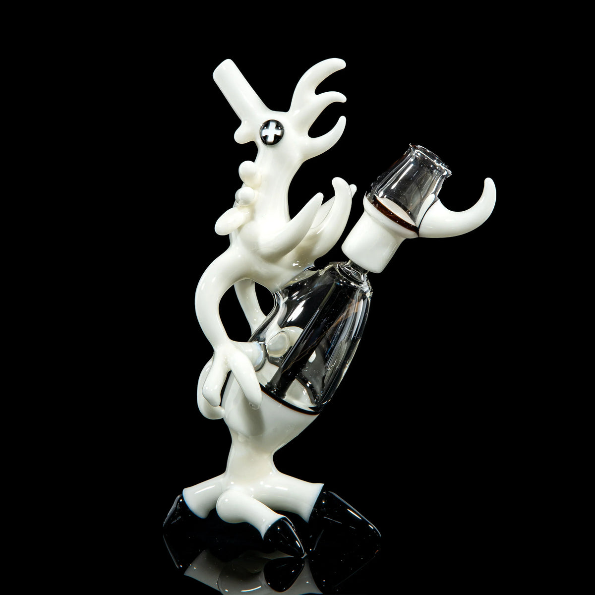Black and white chicken-shaped glass pipe with unique artistic design on black background.