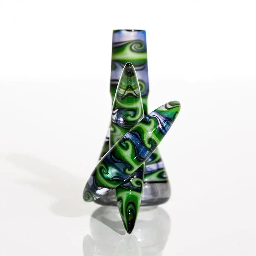 Colorful glass slide with green, blue, and black patterned double crescent design, 14mm joint.
