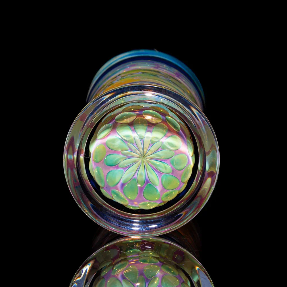Heady glass art tube with colorful flower pattern and iridescent finish on black background