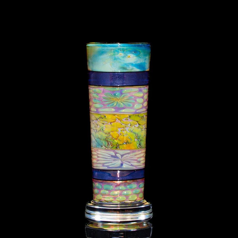 Colorful heady glass tube with intricate patterns, ideal for smoke shop display