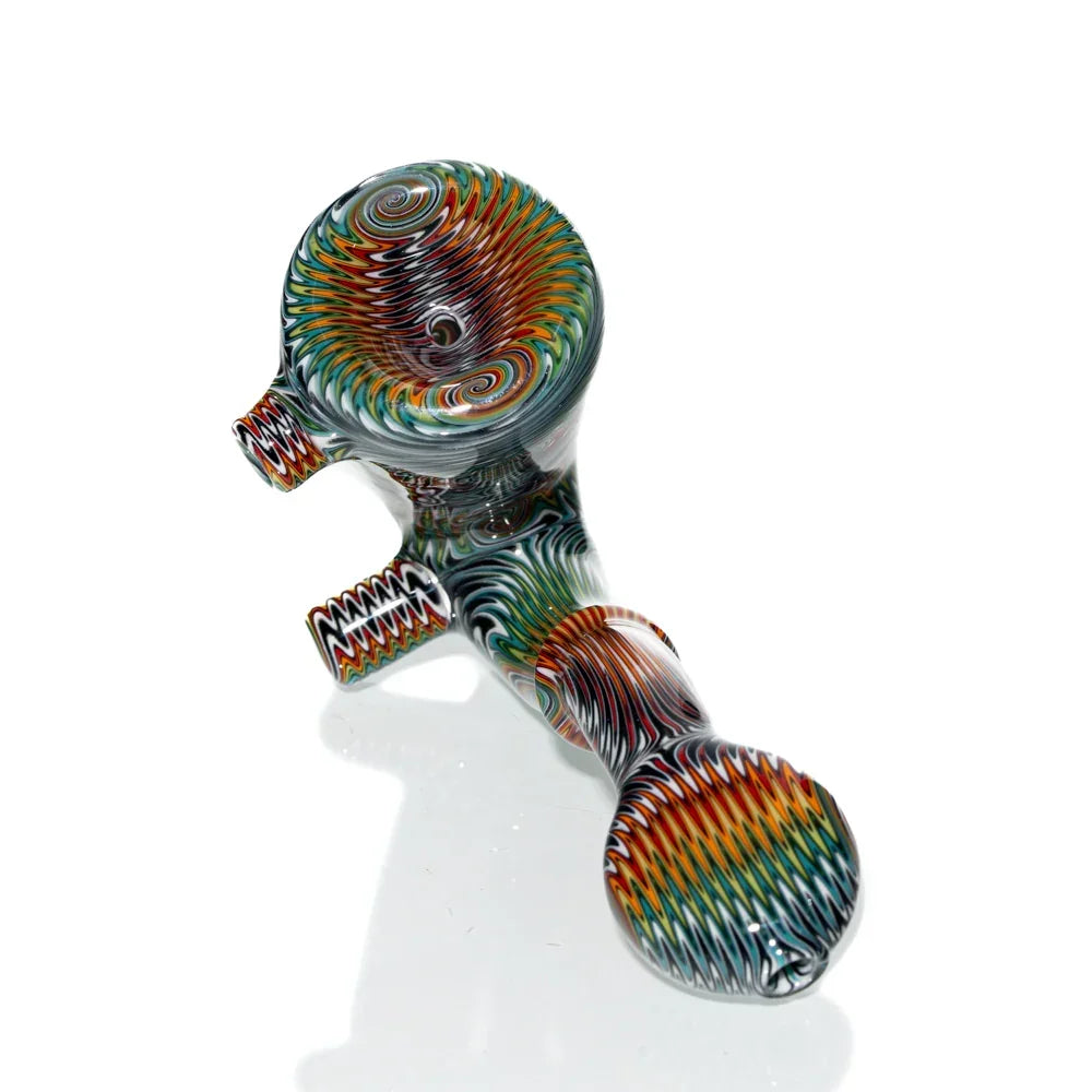 Colorful rainbow wig wag sherlock glass pipe with bold swirling patterns on white background