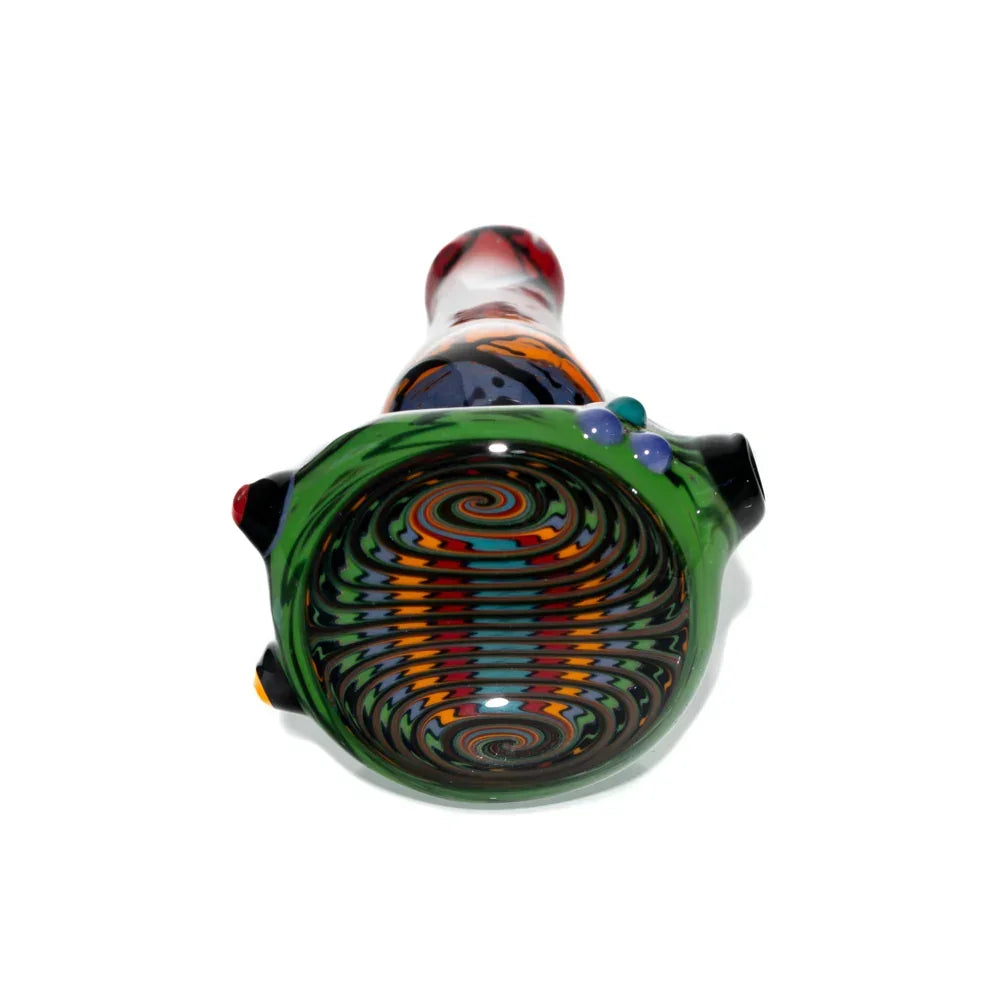 Green rainbow wig wag glass hand pipe with colorful spiral pattern, viewed from the side