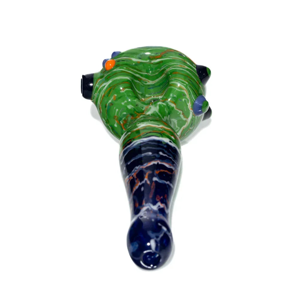 Green and navy wig wag pattern glass hand pipe with colorful marble accents on white background