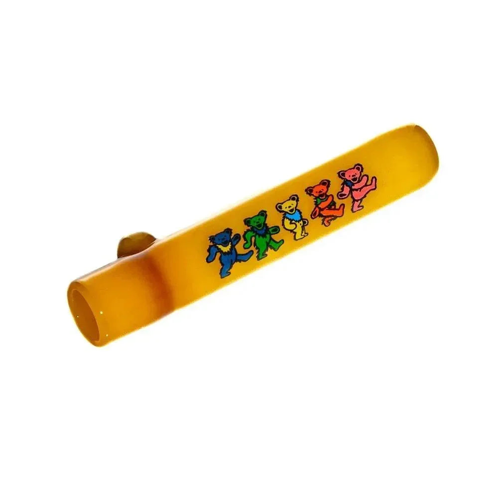 Amber glass chillum with colorful dancing bear designs on a white background.
