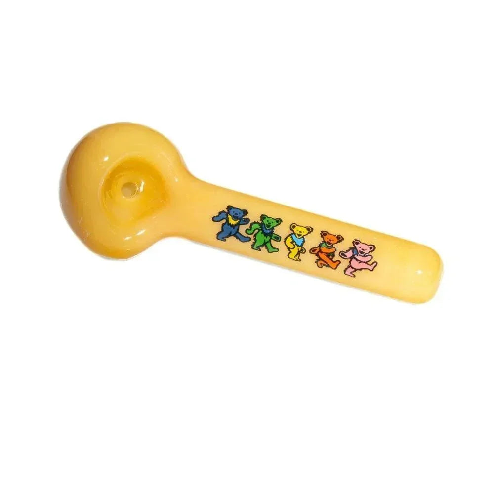 Amber glass hand pipe with colorful dancing bear designs on the handle