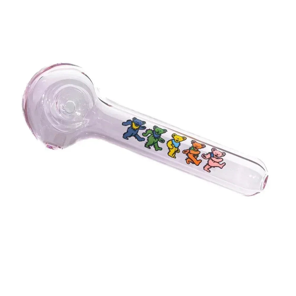 Light pink glass hand pipe with colorful dancing bear designs on the stem, white background.