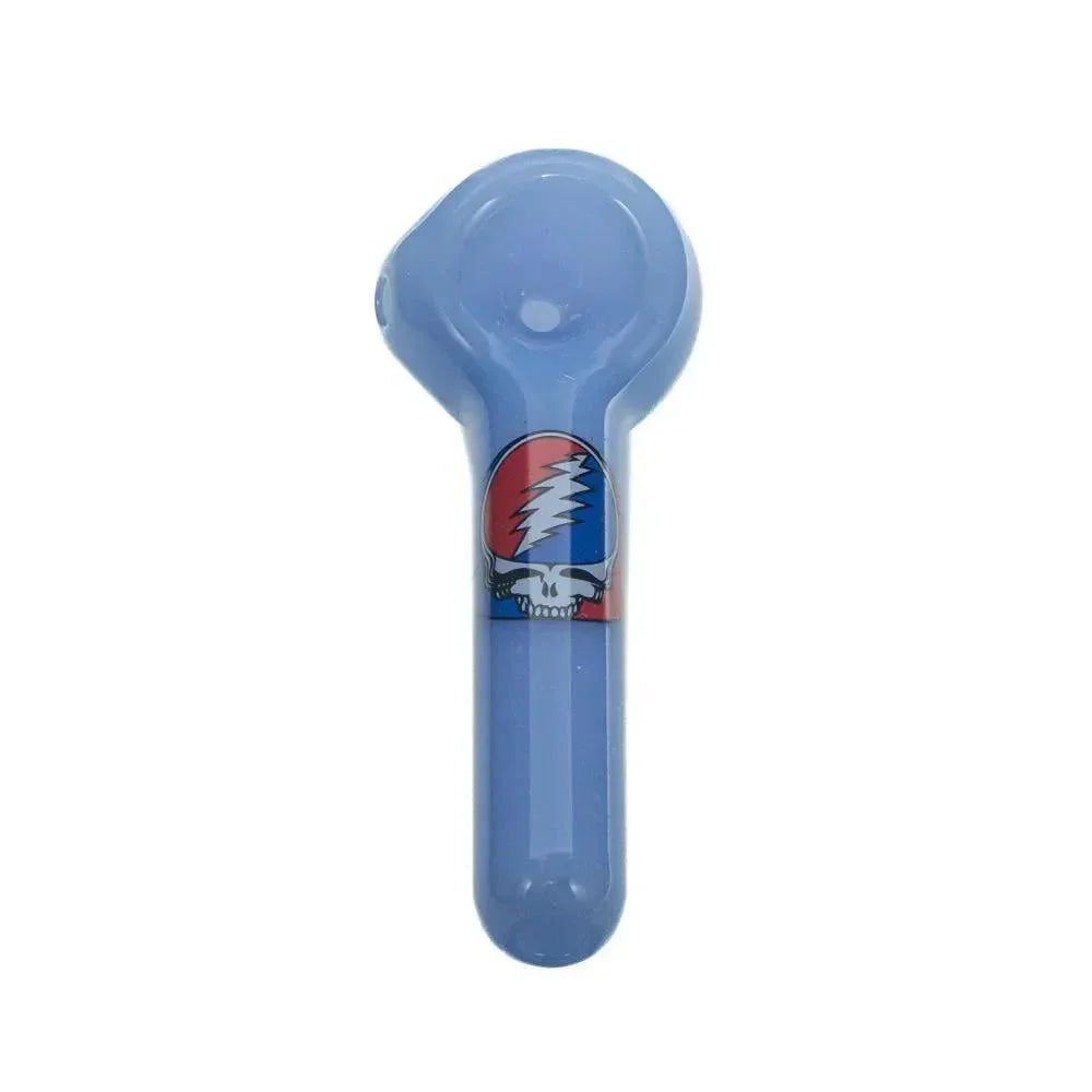Milky blue glass spoon pipe with skull and lightning bolt decal on bowl