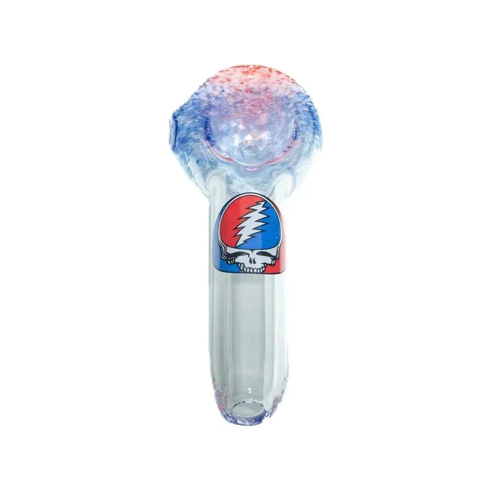 Clear glass hand pipe with red, white, and blue frit design and Stealie skull decal
