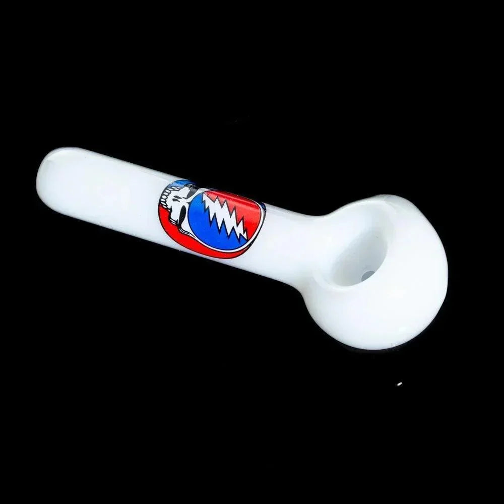 White glass hand pipe with colorful Steal Your Face decal on black background