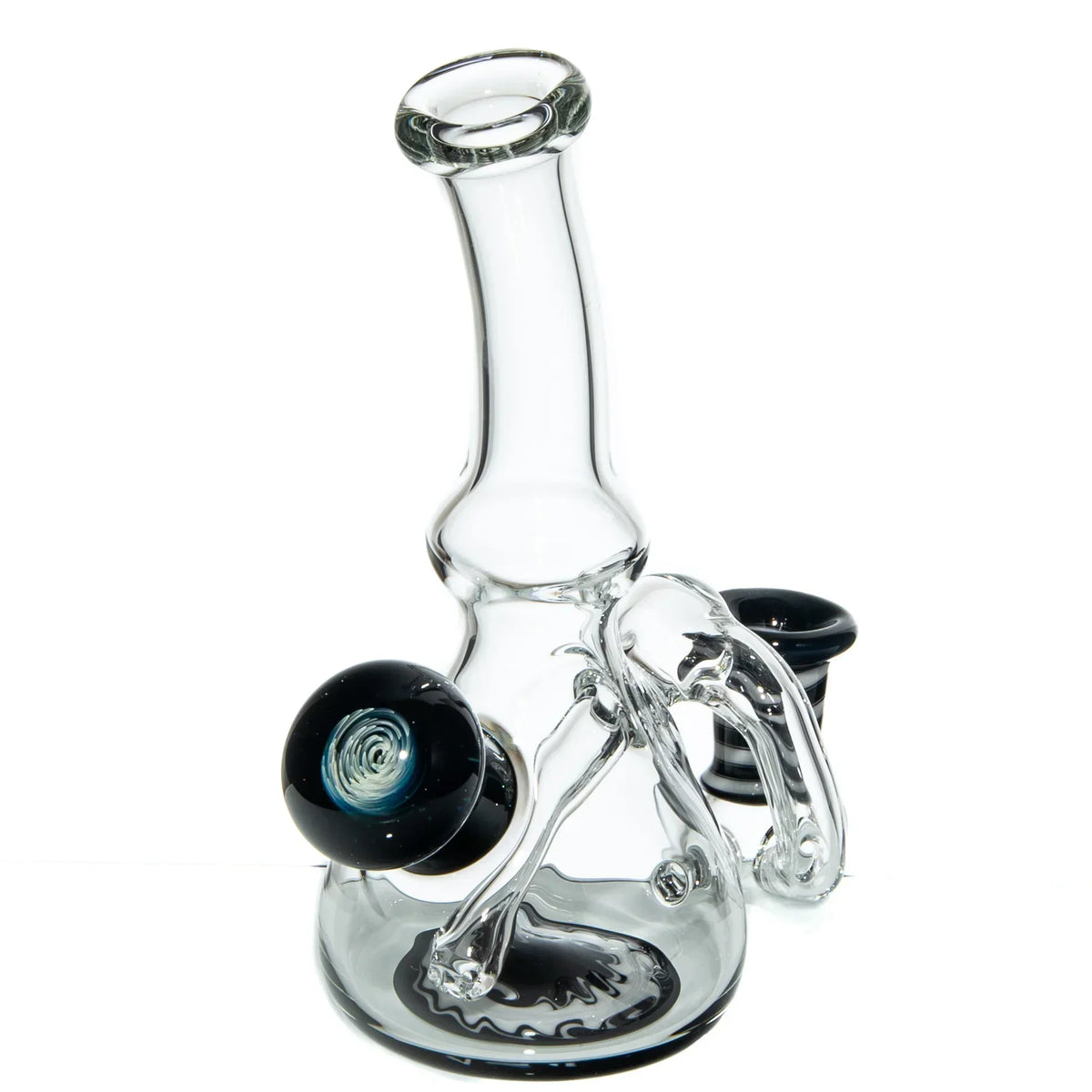 Handcrafted clear glass water pipe with black and white accents and artistic details