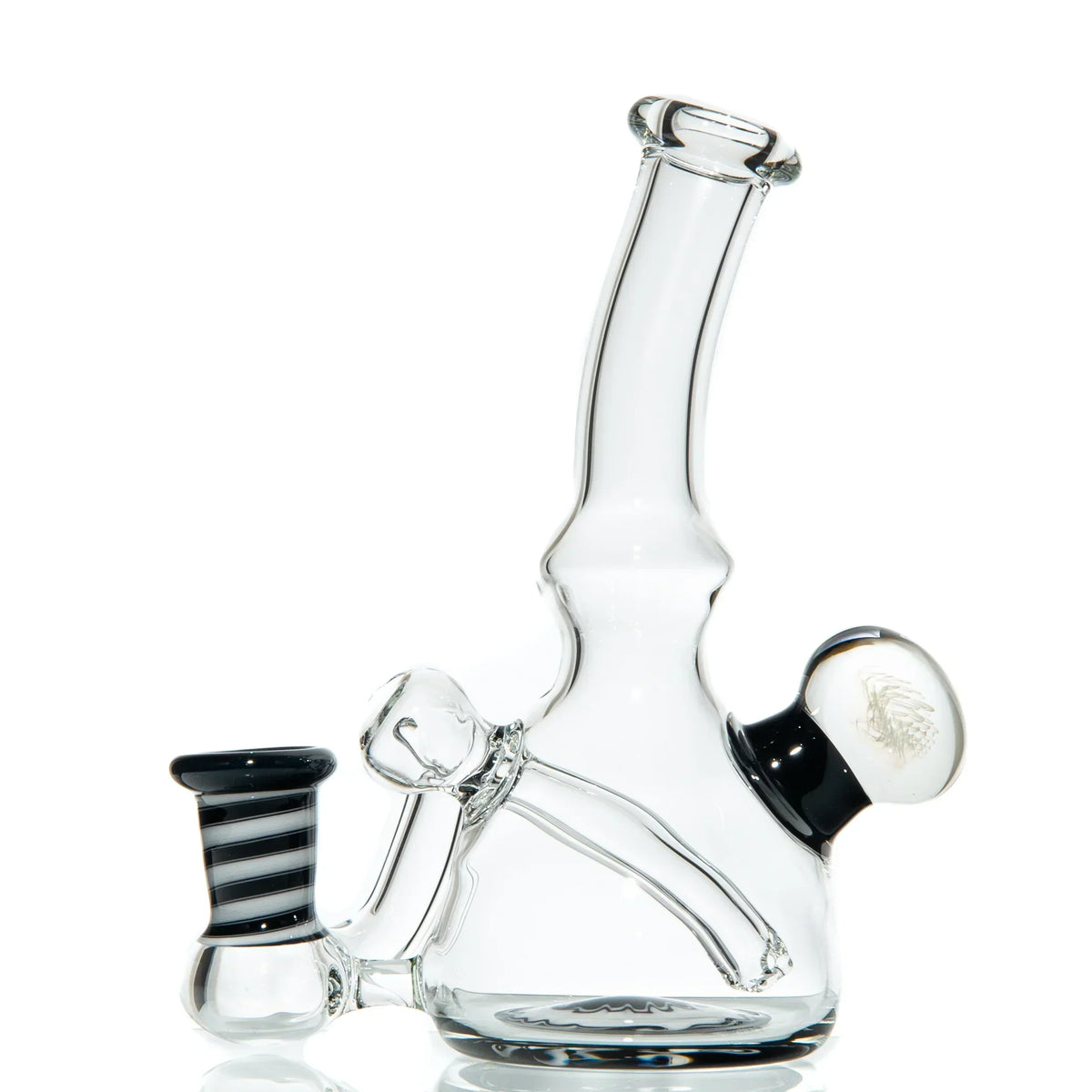 Clear glass water pipe with black and white striped accents on a white background