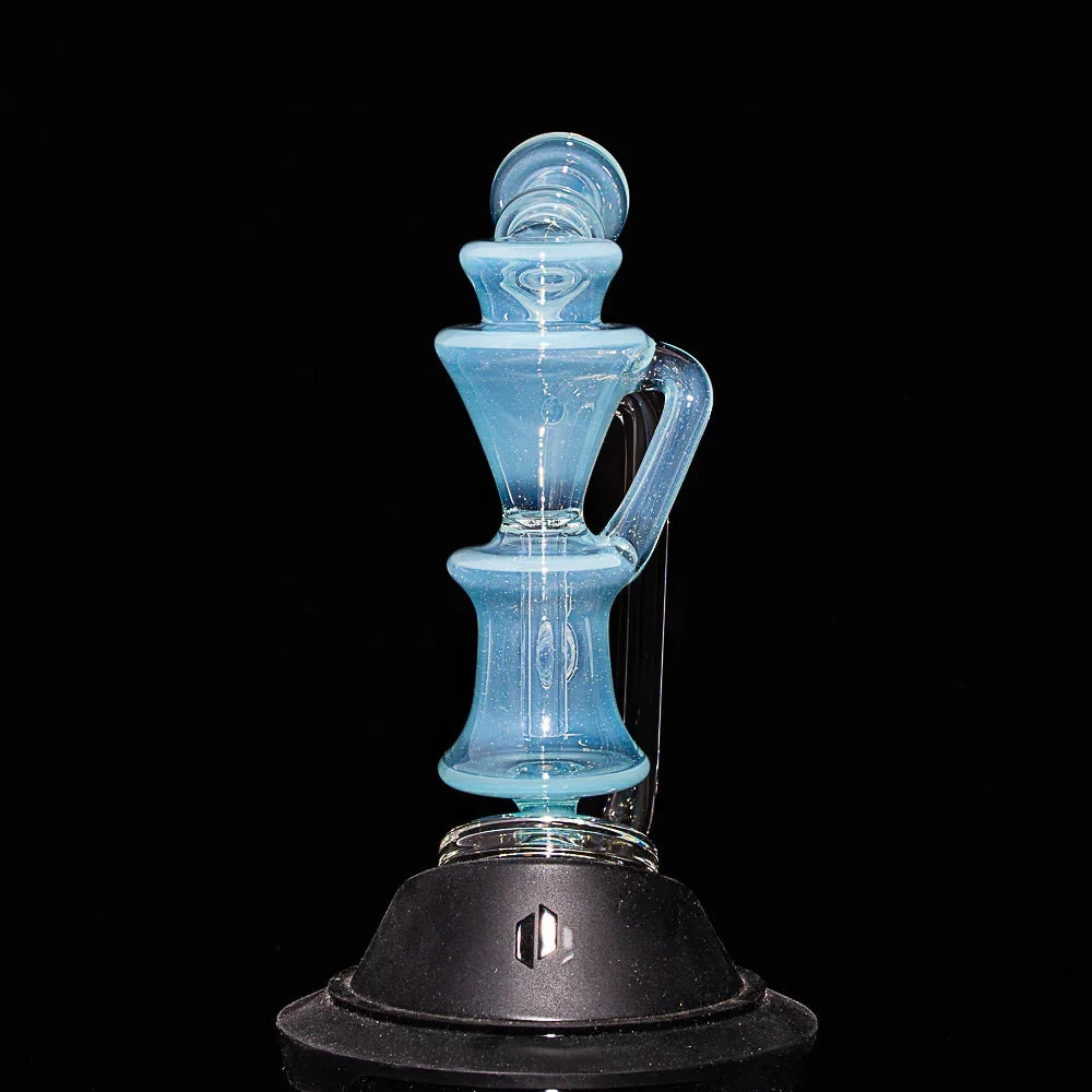 Blue glass recycler water pipe with curved handle on black background