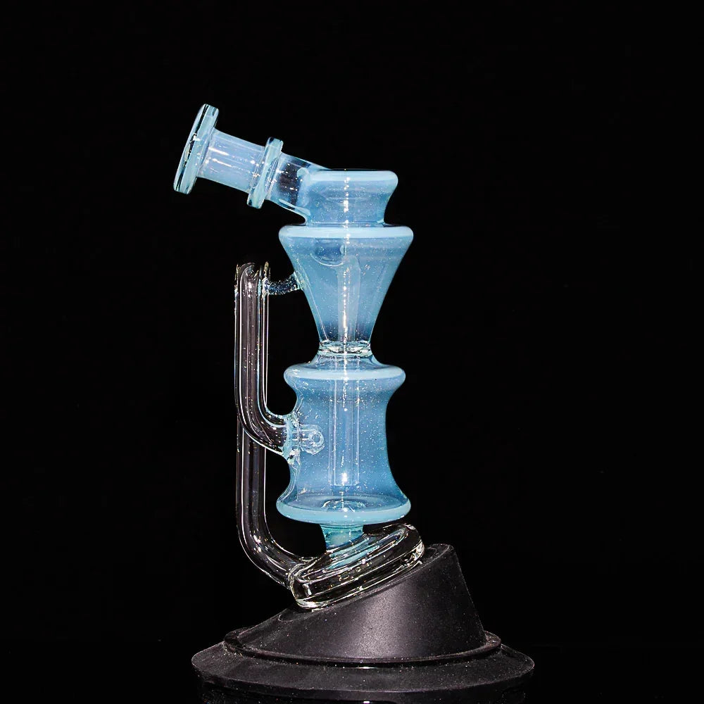 Blue glass recycler water pipe with unique funnel design on black background