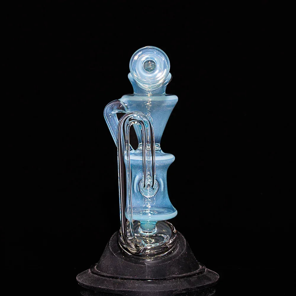 Blue glass recycler water pipe with unique curved design on black background