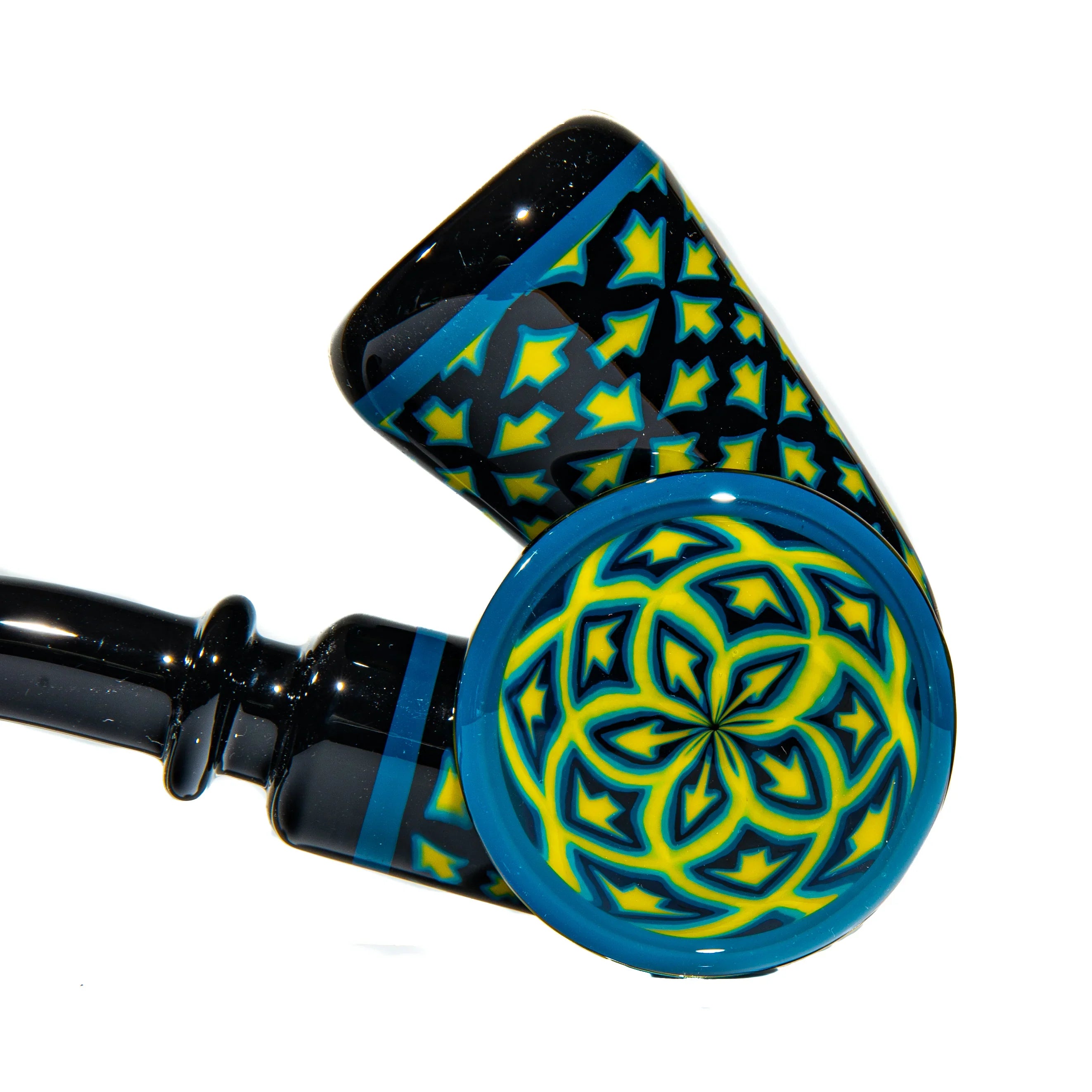 Colorful glass hand pipe with blue and yellow geometric patterns, black background